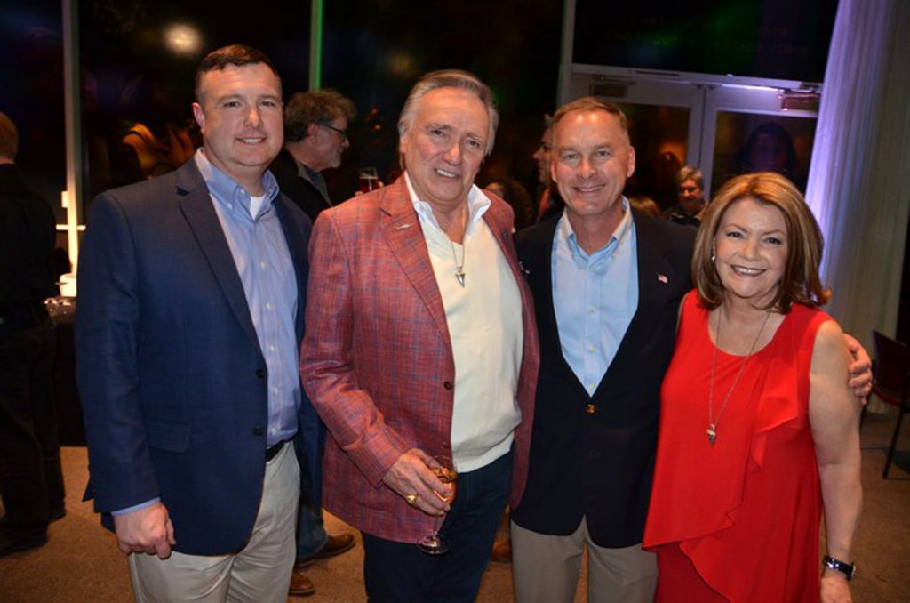 Brian and Sandy Stewart with Coast Guard Captain Jeffrey Janszen and Clint Prindle